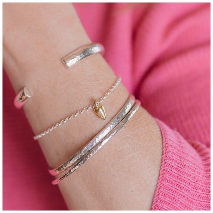 9ct gold heart bracelet with stacker cuffs and silver bangles