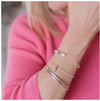 9ct gold heart bracelet with stacker cuffs and silver bangles