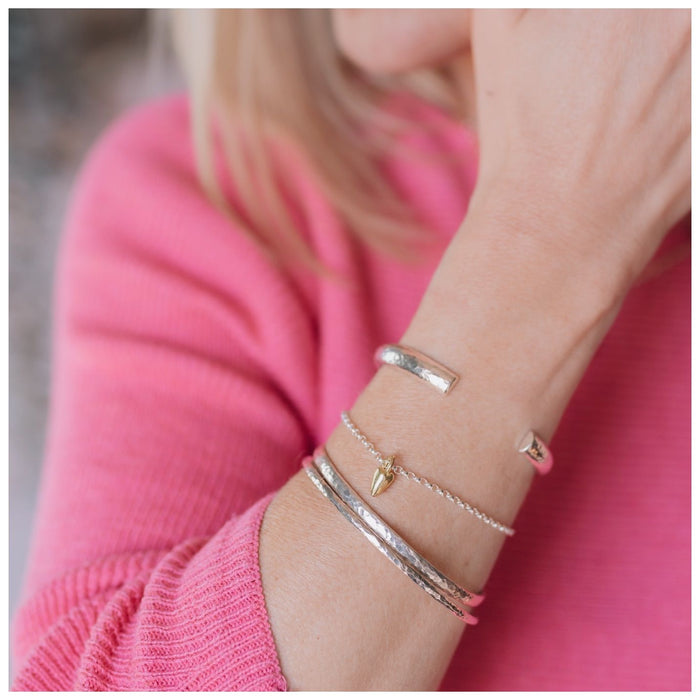 9ct gold heart bracelet with stacker cuffs and silver bangles