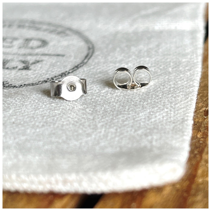 Earring scrolls, butterflies, earring backs