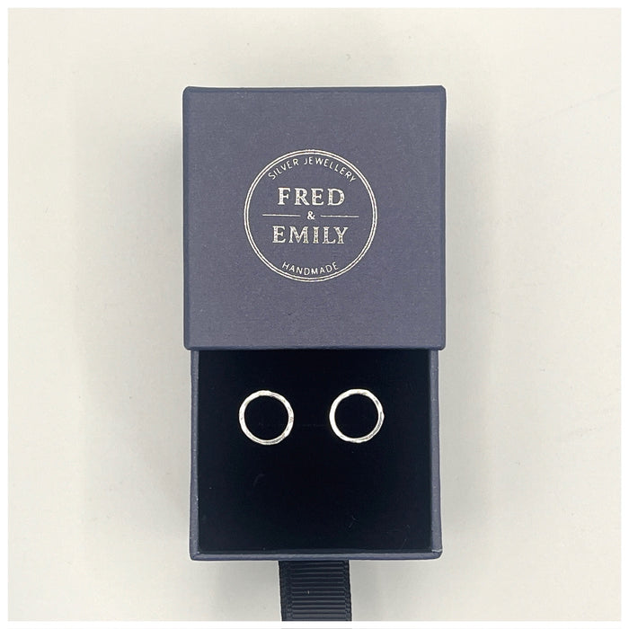 Mini halo or circle stud earrings set in a Navy Fred & Emily Blue Box